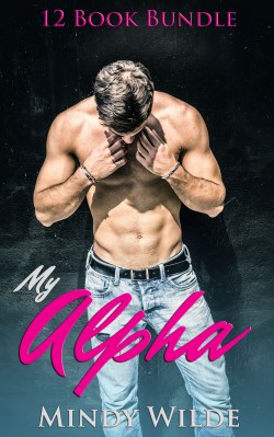 Handsome bearded shirtless young man standing against black wall